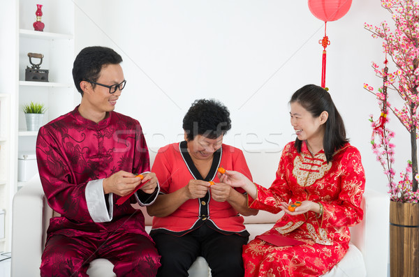 chinese family celebrating lunar new year Stock photo © yuliang11