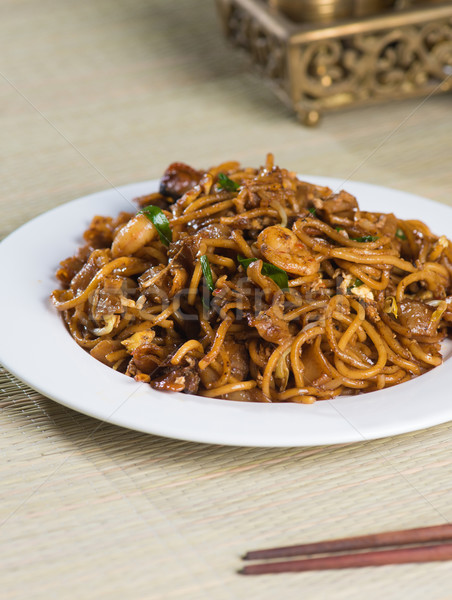 Fried Penang Char Kuey Teow which is a popular noodle dish in Ma Stock photo © yuliang11