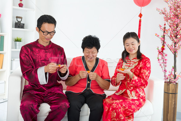 chinese family celebrating lunar new year Stock photo © yuliang11