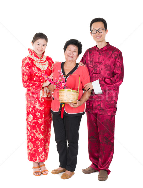 chinese new year family with ang pow symbol of luck Stock photo © yuliang11