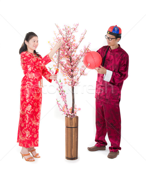 chinese new year family with ang pow symbol of luck Stock photo © yuliang11