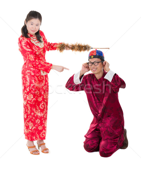 asian bride punishing his groom Stock photo © yuliang11