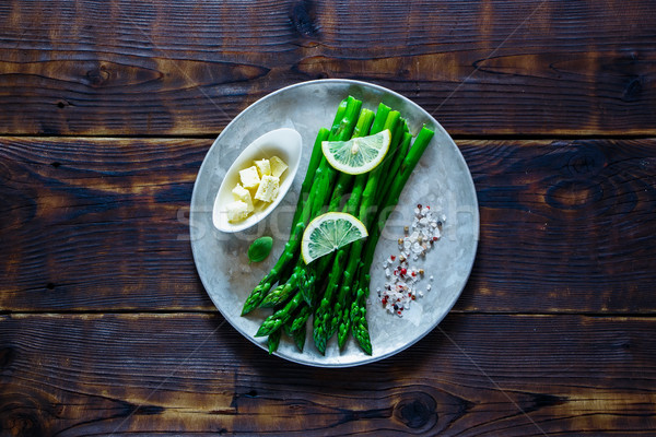 Cooked asparagus on plate Stock photo © YuliyaGontar