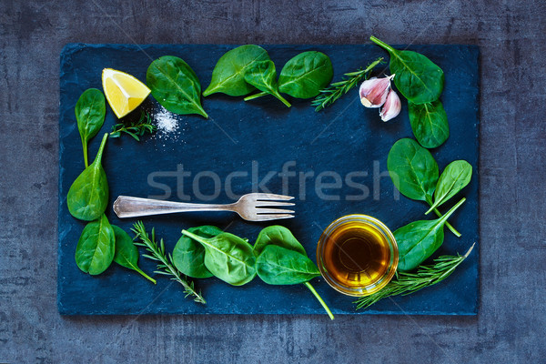 spinach leaves and olive oil Stock photo © YuliyaGontar