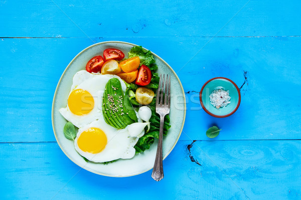 Fried eggs and vegetables Stock photo © YuliyaGontar