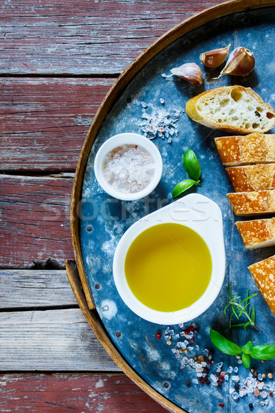 Baguette, Olive oil and basil Stock photo © YuliyaGontar