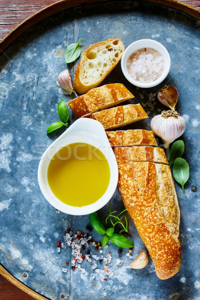 Baguette, Olive oil and basil Stock photo © YuliyaGontar