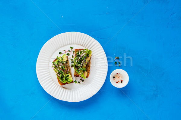 Avocado toasts on plate Stock photo © YuliyaGontar