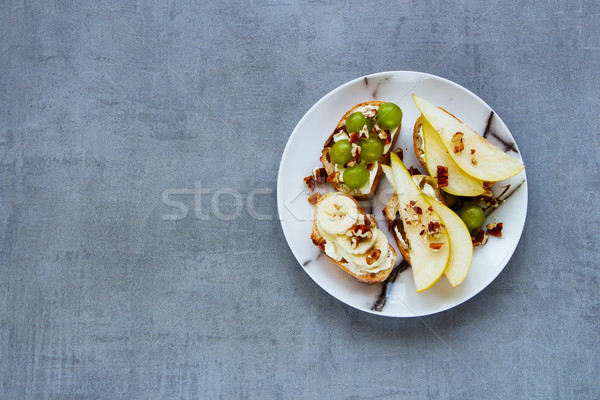 Crostini with fruits Stock photo © YuliyaGontar