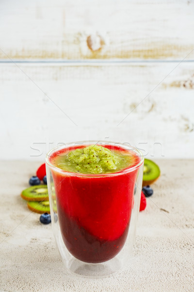 Réteges gyümölcs smoothie friss három szín Stock fotó © YuliyaGontar