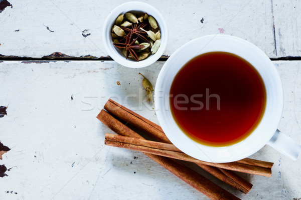 Kubek herbaty biały przyprawy cynamonu anyż Zdjęcia stock © YuliyaGontar