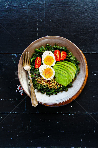 Quinoa, kale and egg bowl Stock photo © YuliyaGontar