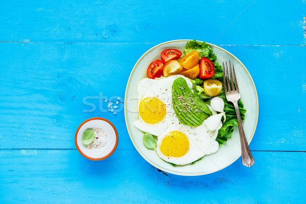 Fried eggs and vegetables Stock photo © YuliyaGontar