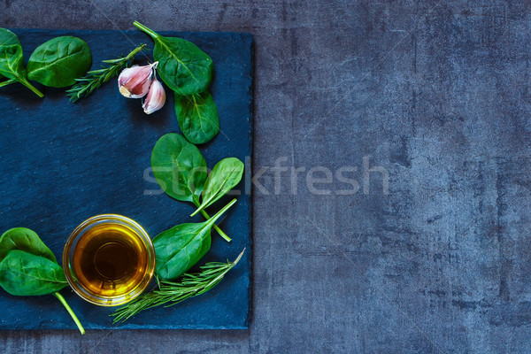 spinach leaves and olive oil Stock photo © YuliyaGontar