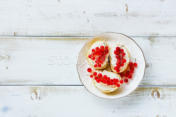 Crostinis with red currants Stock photo © YuliyaGontar