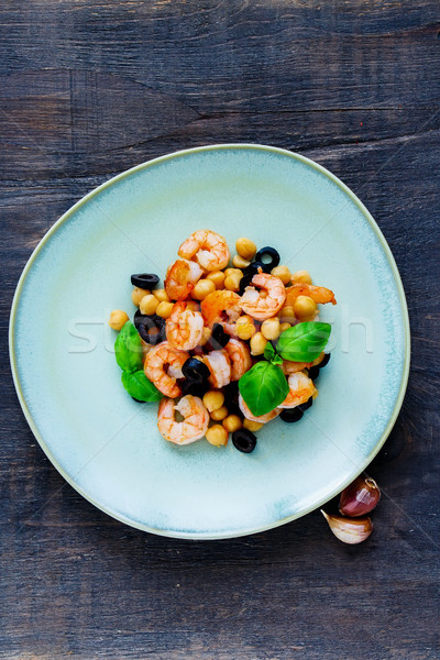 Chickpeas salad in plate Stock photo © YuliyaGontar