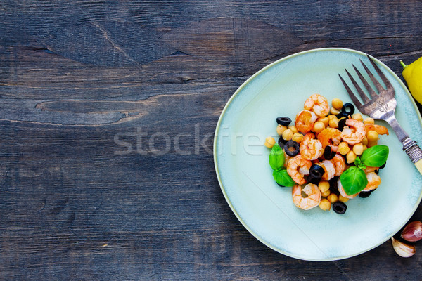 Chickpeas salad in plate Stock photo © YuliyaGontar