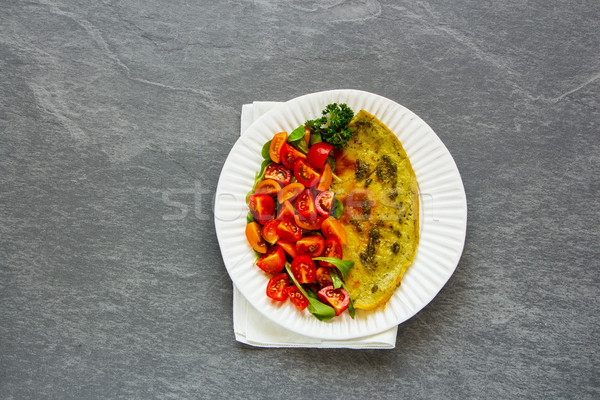 Stock photo: Omelette with arugula and tomatoes salad