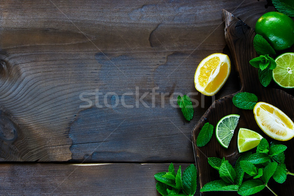 Citrus citromok menta felső kilátás szeletel Stock fotó © YuliyaGontar