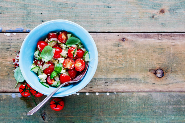 Salad bowl with vegetables Stock photo © YuliyaGontar