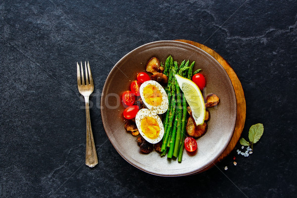 Aspargus and egg on plate Stock photo © YuliyaGontar