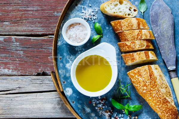 Baguette, Olive oil and basil Stock photo © YuliyaGontar