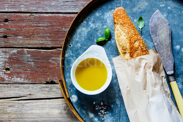 Baguette, Olive oil and basil Stock photo © YuliyaGontar