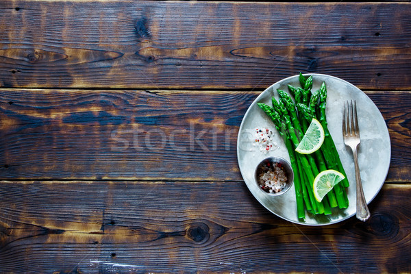 Cooked asparagus on plate Stock photo © YuliyaGontar