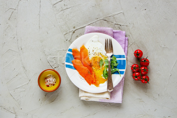 Smoked salmon and fried eggs Stock photo © YuliyaGontar