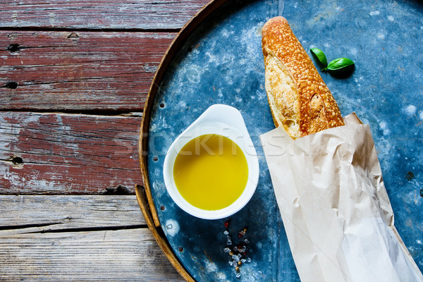 Baguette, Olive oil and basil Stock photo © YuliyaGontar