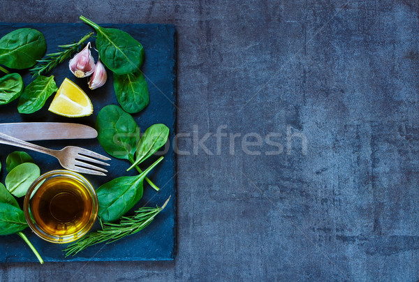 spinach leaves and olive oil Stock photo © YuliyaGontar