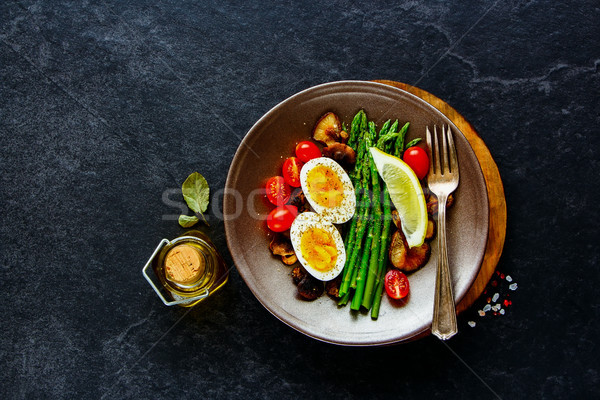 Aspargus and egg on plate Stock photo © YuliyaGontar