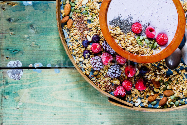 Wooden bowl of smoothie Stock photo © YuliyaGontar