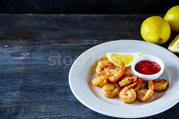 Roasted prawns with sauce Stock photo © YuliyaGontar