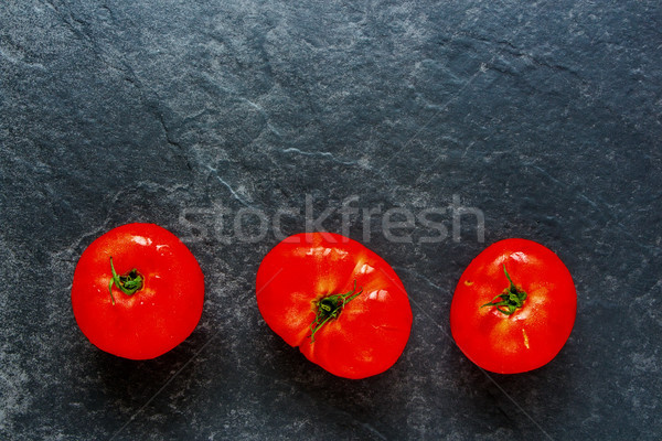 Tomato on dark Stock photo © YuliyaGontar
