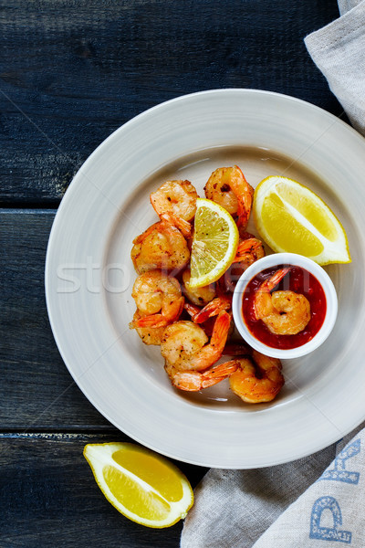 Roasted prawns with sauce Stock photo © YuliyaGontar