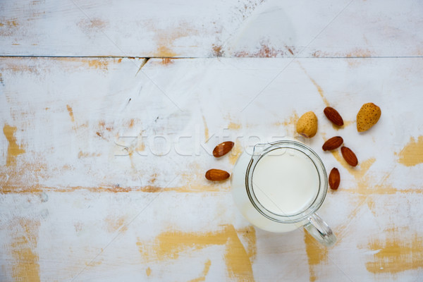 Almond milk in jug Stock photo © YuliyaGontar