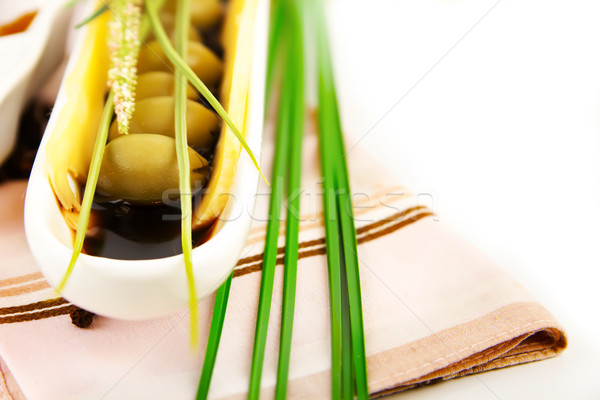 Verde azeitonas molho cerâmico prato comida Foto stock © yura_fx