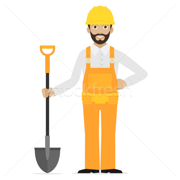 Builder holds in hand shovel Stock photo © yuriytsirkunov