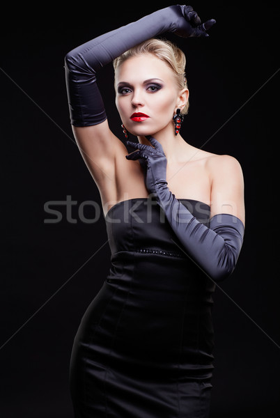Mulher loira vestido preto jovem longo luvas escuro Foto stock © zastavkin