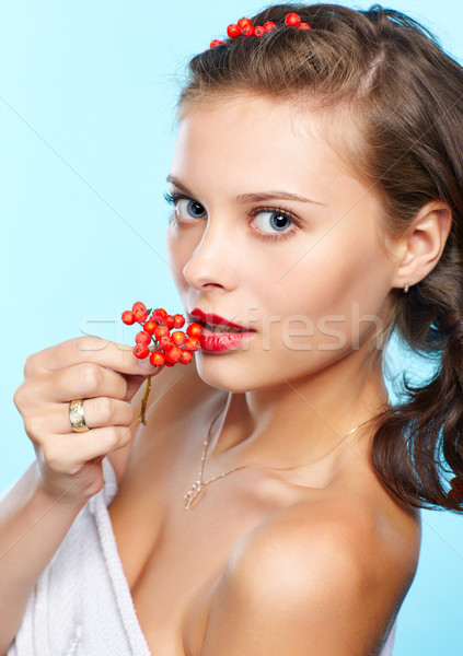 beautiful brunette with ashberries Stock photo © zastavkin