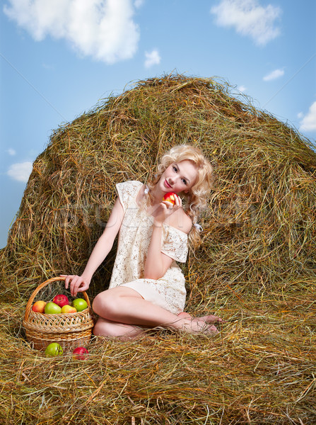 Stock photo: country girl on hay
