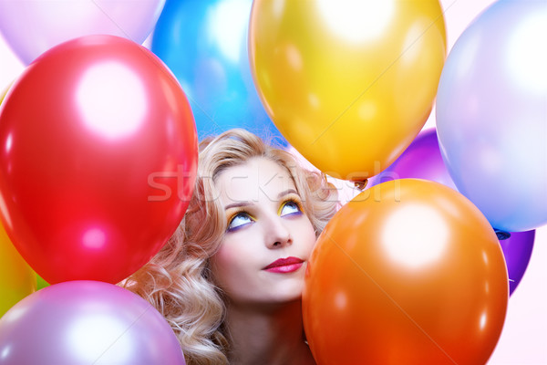 Stock photo: blonde girl with balloons