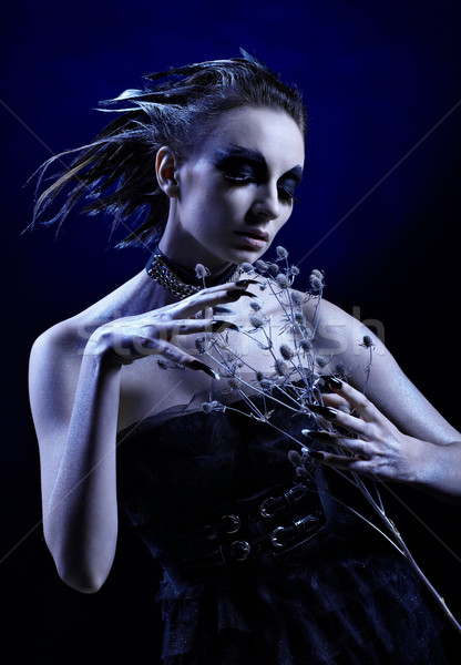 Girl with with fever-weed Stock photo © zastavkin