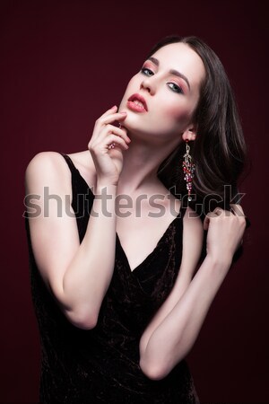Fiatal gyönyörű nő fekete ruha zöld pisztácia szín Stock fotó © zastavkin