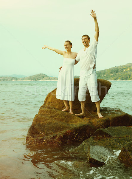 Instagram colorized vintage couple on beach portrait  Stock photo © zastavkin
