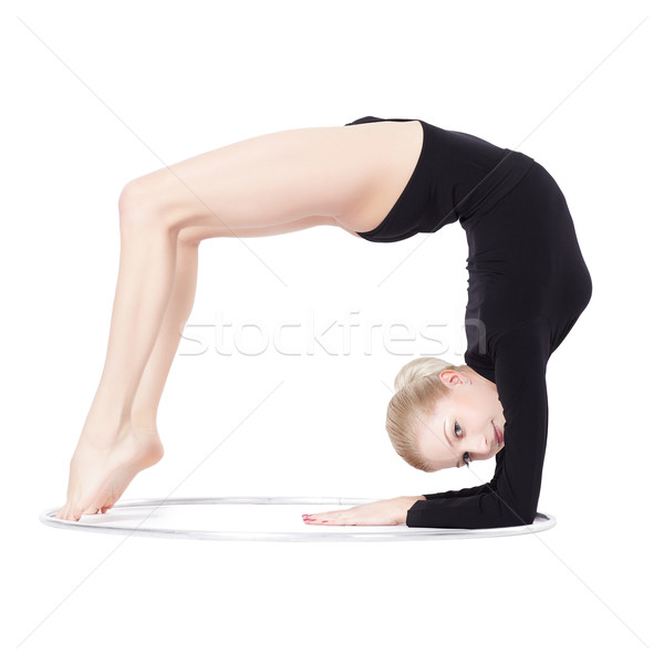 Stock photo: blonde gymnast with hula hoop