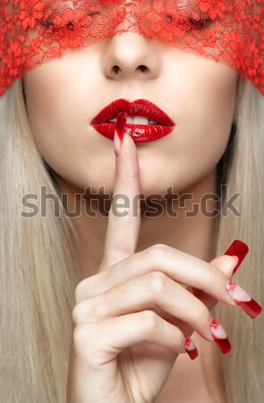 woman with red lacy ribbon on eyes Stock photo © zastavkin