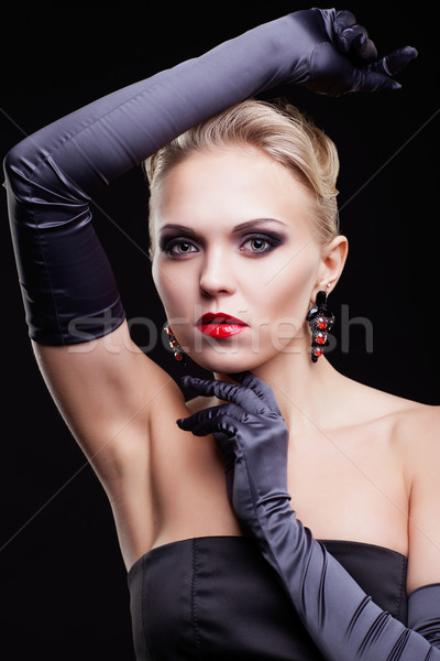 Mulher loira vestido preto jovem longo luvas escuro Foto stock © zastavkin