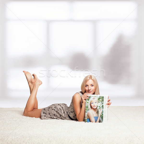 Blonde woman with calendar Stock photo © zastavkin